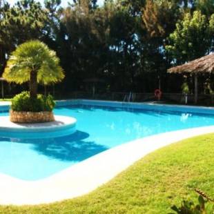 Фотографии гостевого дома
3 bedrooms house with shared pool and enclosed garden at Islantilla Huelva 1 km away from the beach