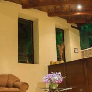 Фотография мини отеля Hotel y Bungalows Santa Ana