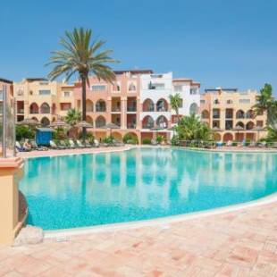 Фотографии гостиницы 
            Jardim da Meia Praia Resort