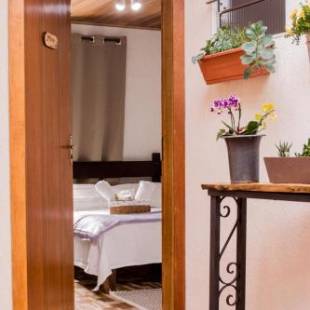 Фотографии мини отеля 
            Suítes para fins de semana