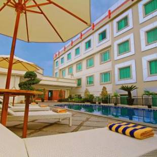 Фотографии гостиницы 
            Rocky Plaza Hotel Padang