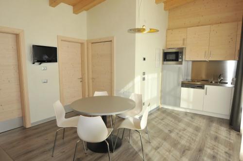 Фотографии гостиницы 
            Bungalows Chalets Lago di Molveno