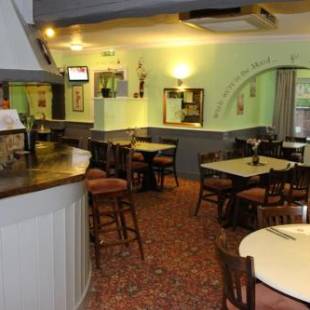 Фотографии мини отеля 
            Oliver Twist Country Inn