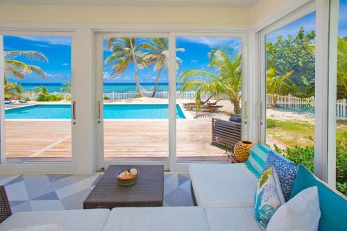 Фотографии гостевого дома 
            Babylon Reef by Grand Cayman Villas
