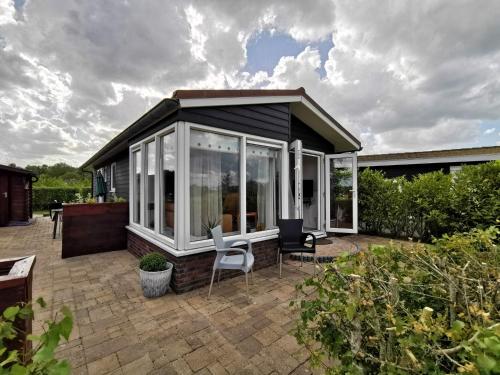 Фотография гостевого дома Wuivend Riet gelegen op Resort Venetie