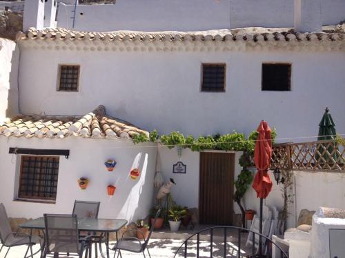 Фотография гостевого дома Cueva Chelaja