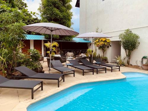 Фотография гостевого дома Sous Le Badamier