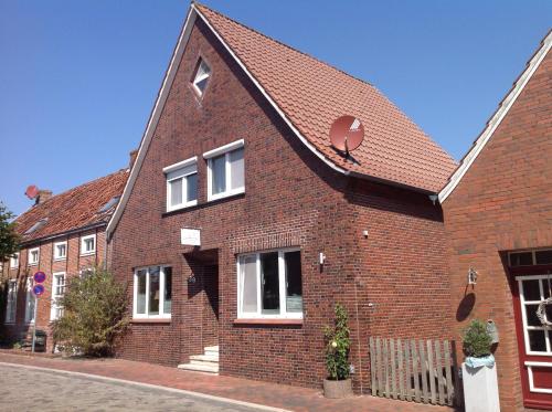 Фотография гостевого дома Vier Sterne am Hafen, Ditzum