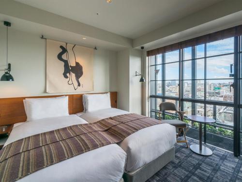 Фотография гостиницы Ebisuholic Hotel