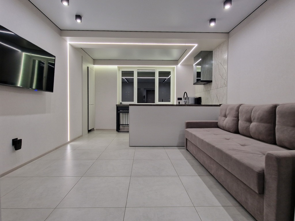 Фотография квартиры Апартаменты в Центре с Гостинной и 2 Спальнями