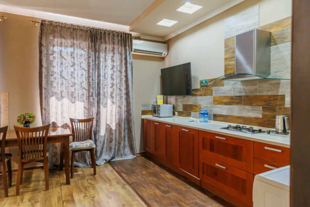 Фотография квартиры Квартира с одной двуспальной и двумя односпальными кроватями