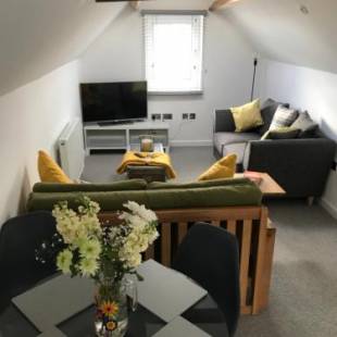 Фотографии гостевого дома 
            Beautiful Coach House