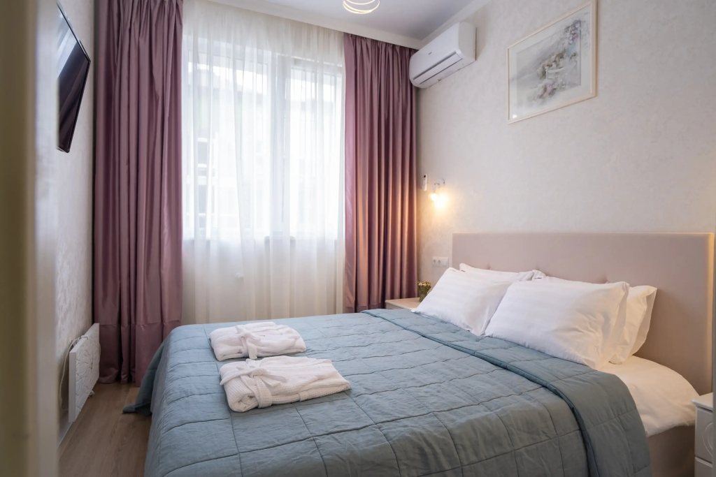 Фотография квартиры Апартаменты Red Apartments Арт Лайт Сити Ремарк