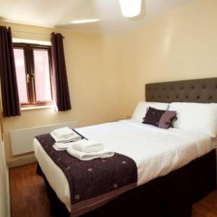 Фотографии гостиницы 
            Cocoon @ International Inn + Apartments