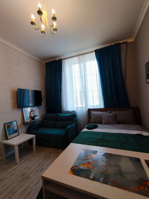 Фотография квартиры Апартаменты  Мятный уголок Уютная студия  с диваном у Ботанического сада