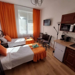 Фотография квартиры Квартира Живи в Песочном Студия Оранж