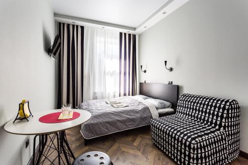 Фотографии мини отеля
Апартаменты Rotas central station studios