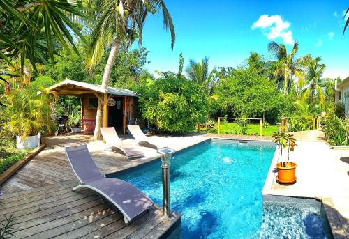 Фотография гостевого дома Gîtes Atemoya. Petit Bas Vent Fort Royal.