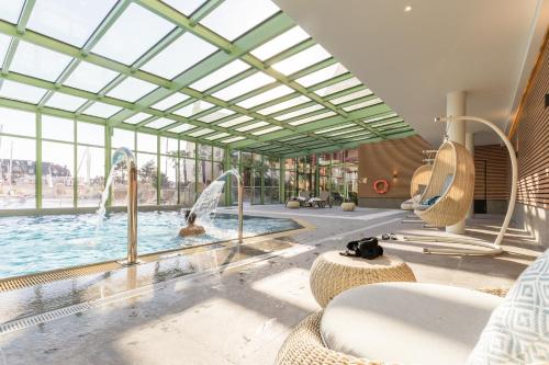 Фотография апарт отеля Résidence Pierre & Vacances Premium Presqu'Ile de la Touques