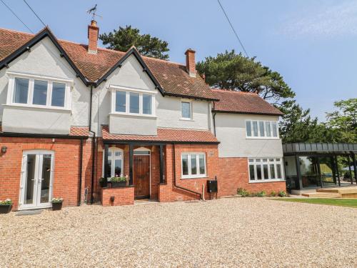 Фотография гостевого дома The Coach House