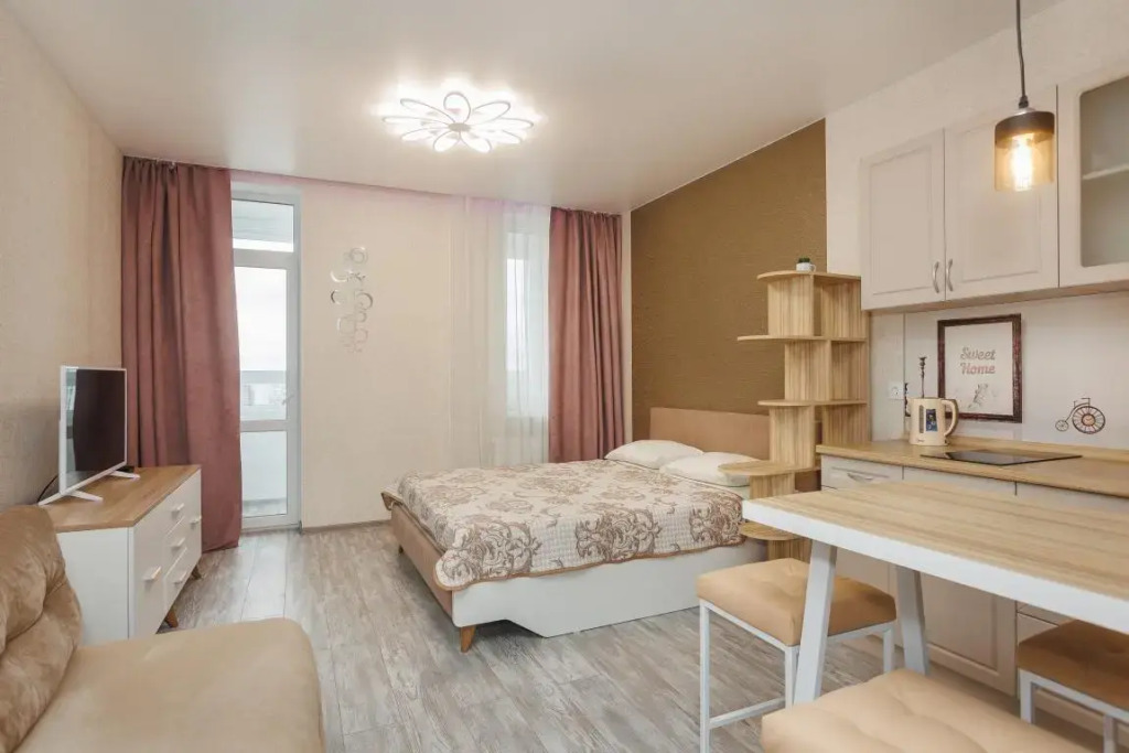 Фотография квартиры Студия Этажидейли на Азина с двуспальной кроватью