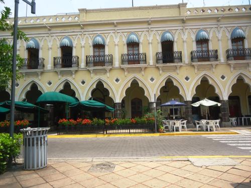 Фотографии гостиницы 
            Hotel Concierge Plaza Colima