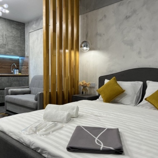 Фотография квартиры Апартаменты Атмосфера в доме Бизнес-класса в центре города