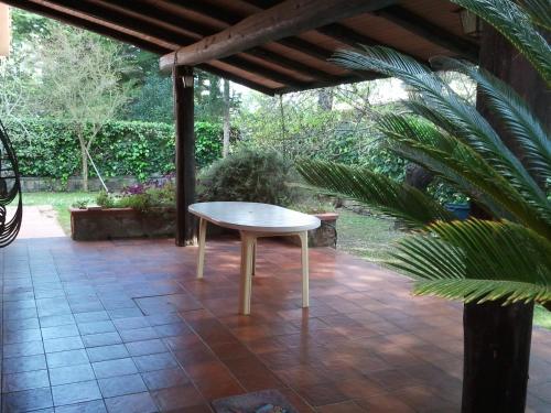 Фотография гостевого дома villetta nel verde vicino spiaggia