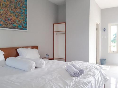 Фотография гостиницы RedDoorz near RS Royal Prima Medan 2