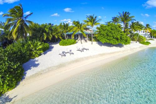 Фотографии гостевого дома 
            Tarasand by Grand Cayman Villas