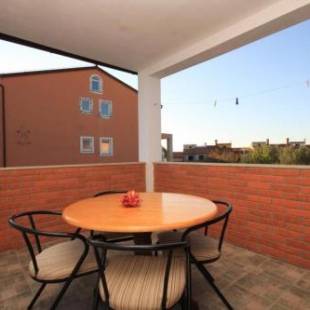 Фотографии гостевого дома 
            Apartments with a parking space Fazana - 7284