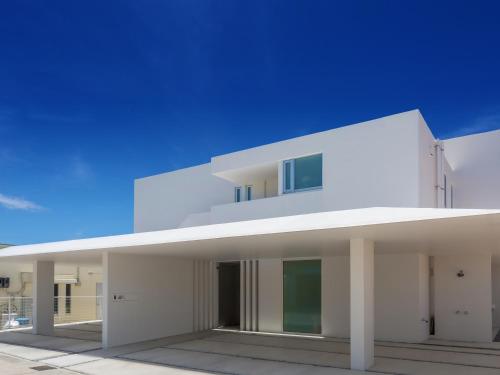 Фотография гостевого дома Kariyushi Condominium Resort Onna Maeda Base