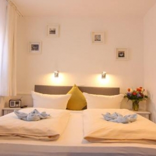 Фотография гостевого дома Kapitaenshaus-Lassen-Zimmer-Mayflower