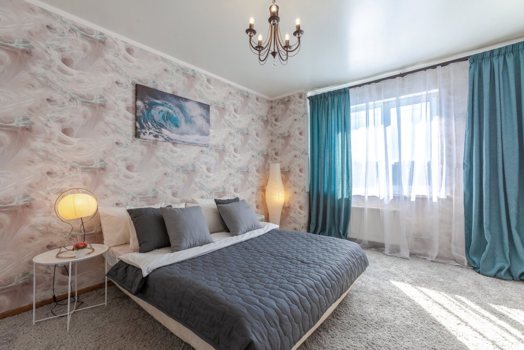 Фотография квартиры Квартира Уютные апарты RENTPLAZA на высоком этаже