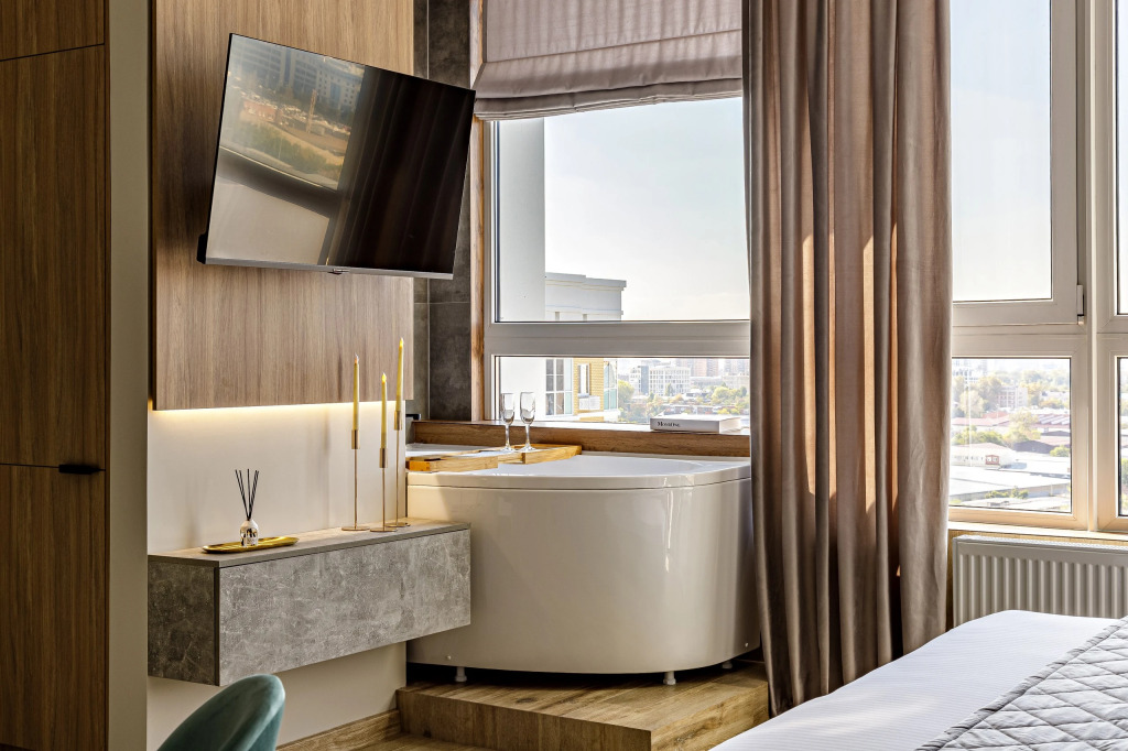 Фотография квартиры Апартаменты VIP студия с роскошной ванной у панорамного окна