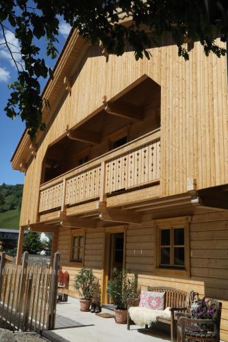 Фотография гостевого дома Schlosswirt Chalets & Apartments