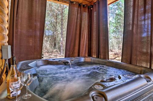 Фотография гостевого дома The Breeze Forested Oasis with Hot Tub and Deck!