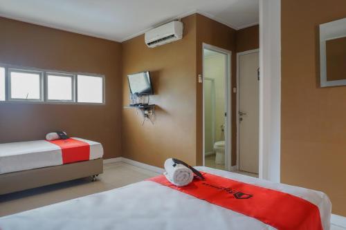 Фотография гостевого дома RedDoorz Plus near Transmart Kairagi Dua manado