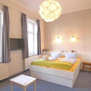 Фотография гостевого дома Kapitaenshaus-Lassen-Zimmer-Amistad