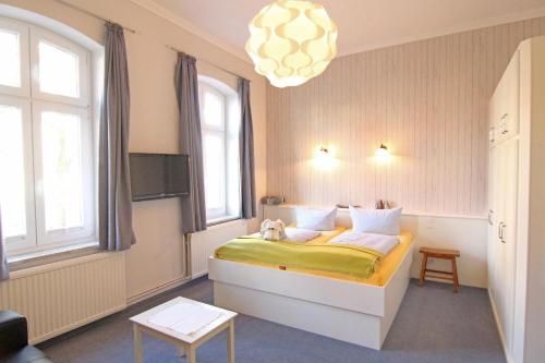 Фотография гостевого дома Kapitaenshaus-Lassen-Zimmer-Amistad