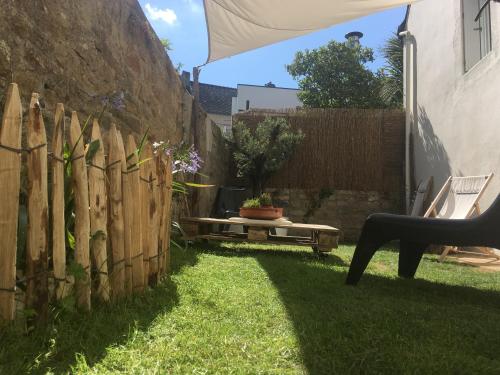 Фотография гостевого дома TY LAUMANN petite maison avec jardin sur le port de vannes avec PARKING souterrain