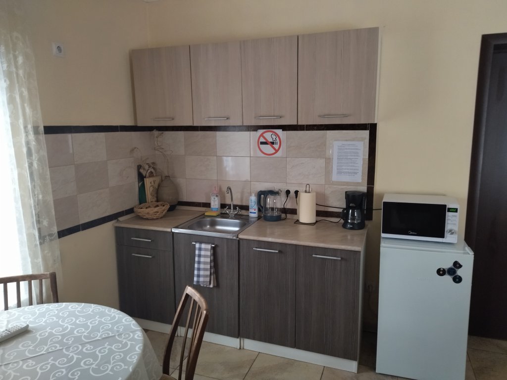 Фотография Коттеджа Дом Одеяло, подушка, мангал