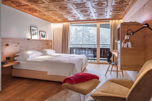 Фотография гостиницы Swiss Alpine Hotel Allalin