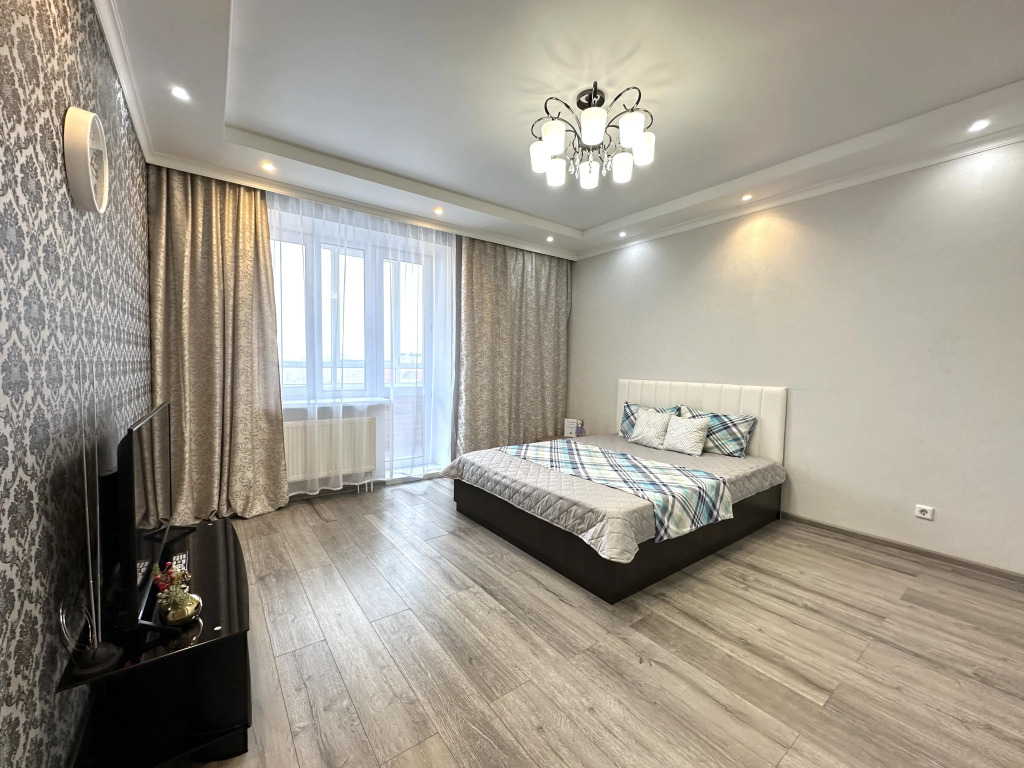 Фотография квартиры Апартаменты с видом на город создают уютную атмосферу