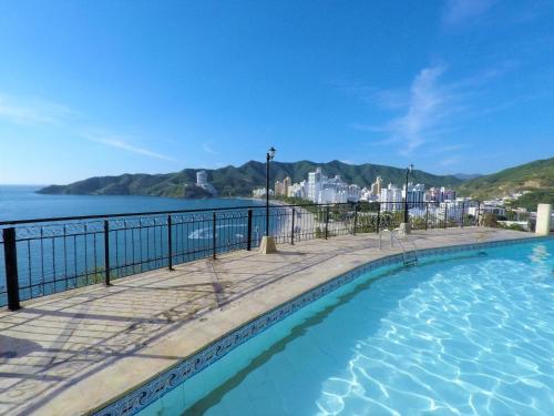 Фотография апарт отеля El Peñon del Rodadero Vista Al Mar Apto