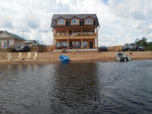 Фотография гостевого дома Дом с пляжем 