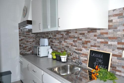 Фотография гостевого дома Casinha das Flores