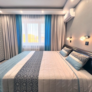 Фотография квартиры Апартаменты Атмосфера - Квартира с Дизайнерским Ремонтом в Центре