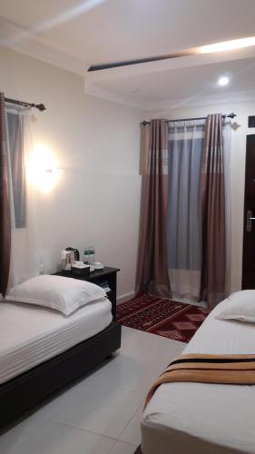 Фотография гостевого дома Syakirah Guest House Syariah