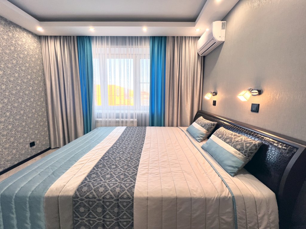 Фотография квартиры Апартаменты Атмосфера - Квартира с Дизайнерским Ремонтом в Центре